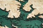 Lewisville Lake, Texas 3D layered wood map in laser-cut Baltic birch, shown framed against a light wall