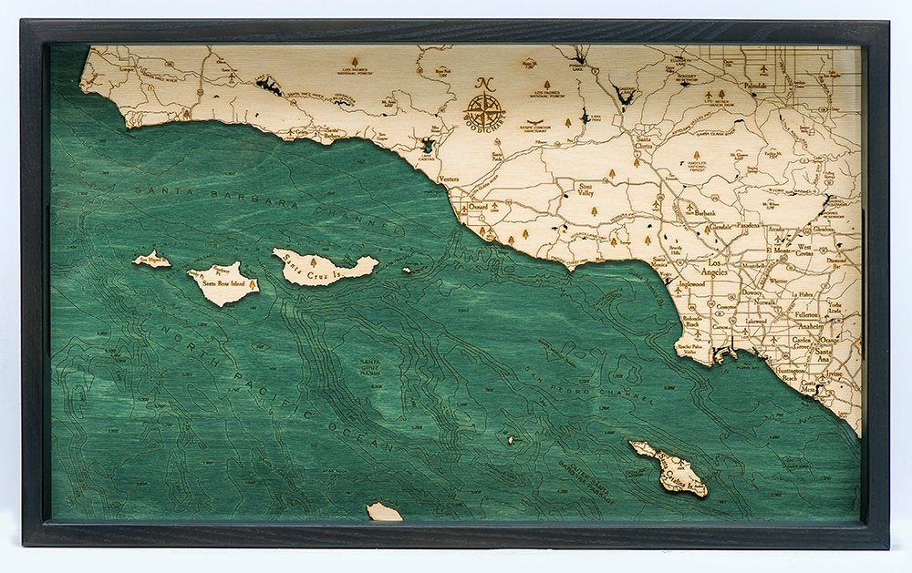 Santa Barbara, California wood serving tray in laser-cut Baltic birch, shown framed against a light wall