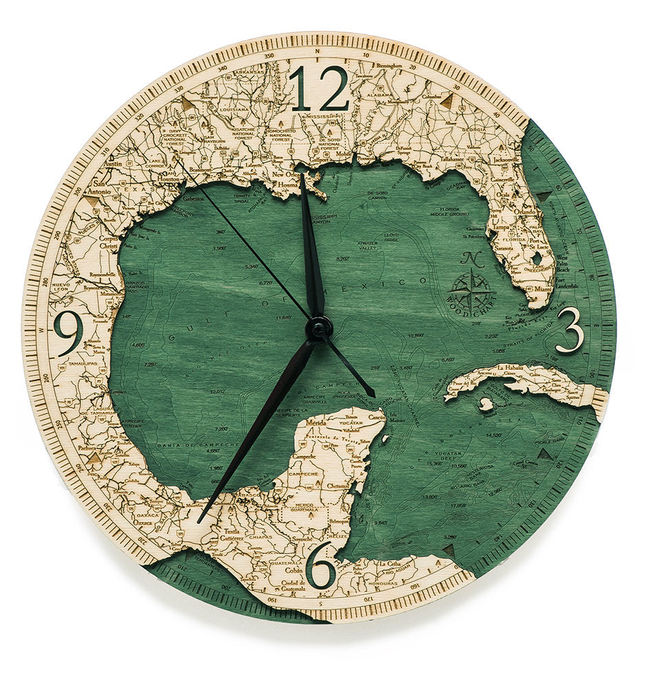 Gulf Of Mexico wood wall clock in laser-cut Baltic birch, shown framed against a light wall