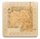Gulf Of Mexico wood cribbage board in laser-cut Baltic birch, shown framed against a light wall