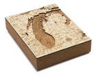 Lake Michigan framed cork map in laser-cut Baltic birch, shown framed against a light wall