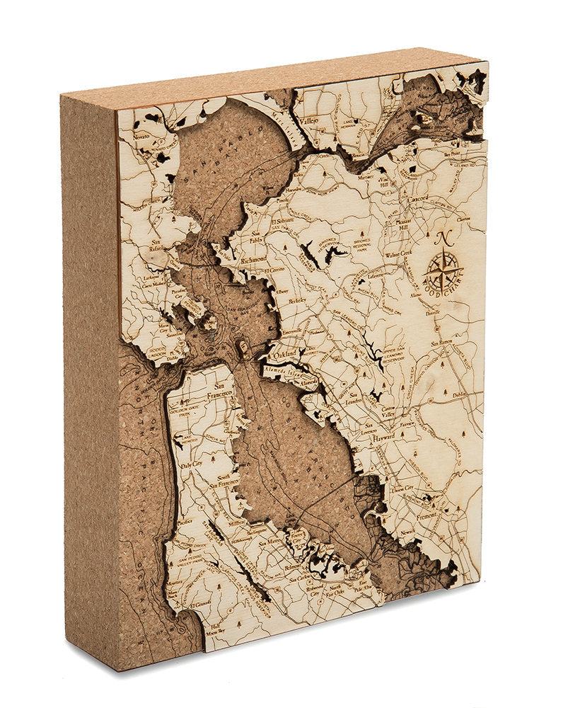San Francisco, California framed cork map in laser-cut Baltic birch, shown framed against a light wall