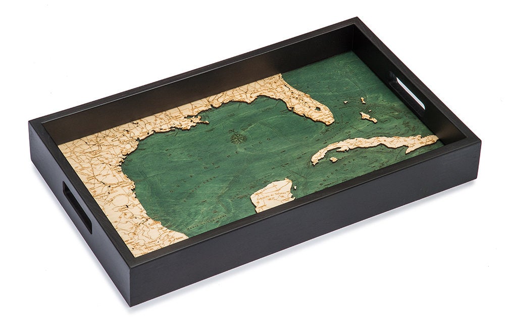 Gulf Of Mexico wood serving tray in laser-cut Baltic birch, shown framed against a light wall
