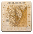 Chesapeake Bay, Maryland wood cribbage board in laser-cut Baltic birch, shown framed against a light wall