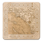 LA to San Diego, California wood cribbage board in laser-cut Baltic birch, shown framed against a light wall