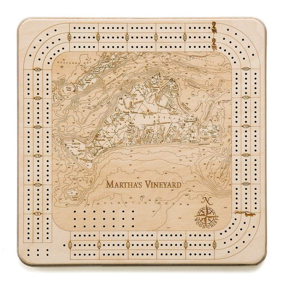 Martha's Vineyard, Massachusetts wood cribbage board in laser-cut Baltic birch, shown framed against a light wall
