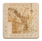 Salish Sea, Washington wood cribbage board in laser-cut Baltic birch, shown framed against a light wall