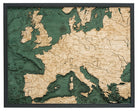 Western Europe 3D layered wood map in laser-cut Baltic birch, shown framed against a light wall