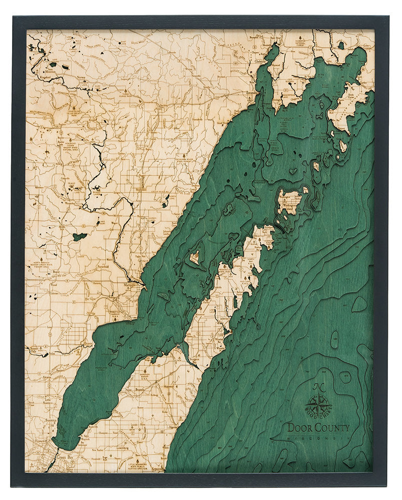 Door County, Wisconsin 3D layered wood map in laser-cut Baltic birch, shown framed against a light wall