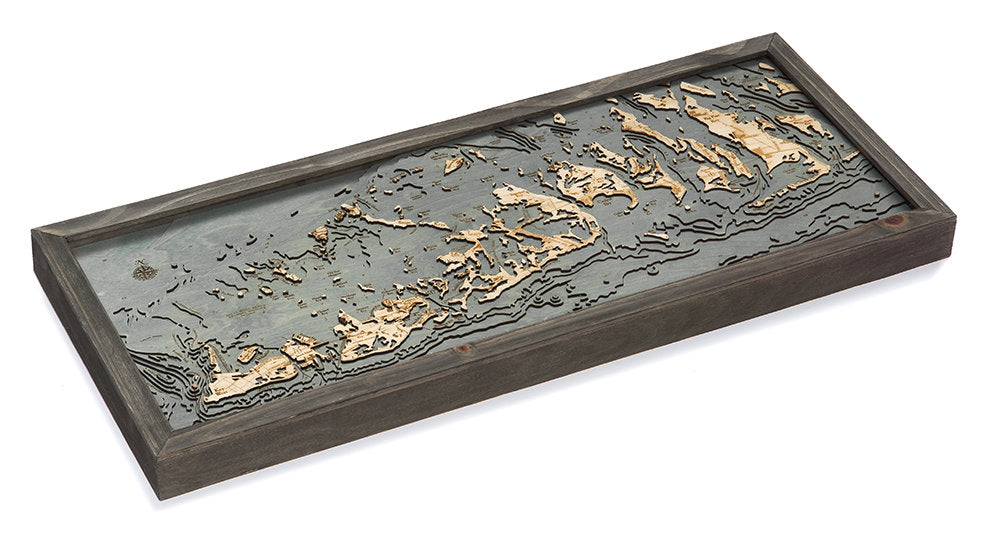 Florida Keys 3D layered wood map in laser-cut Baltic birch, shown framed against a light wall