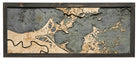 New Orleans, Louisiana 3D layered wood map in laser-cut Baltic birch, shown framed against a light wall