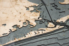 Houston, Texas 3D layered wood map in laser-cut Baltic birch, shown framed against a light wall