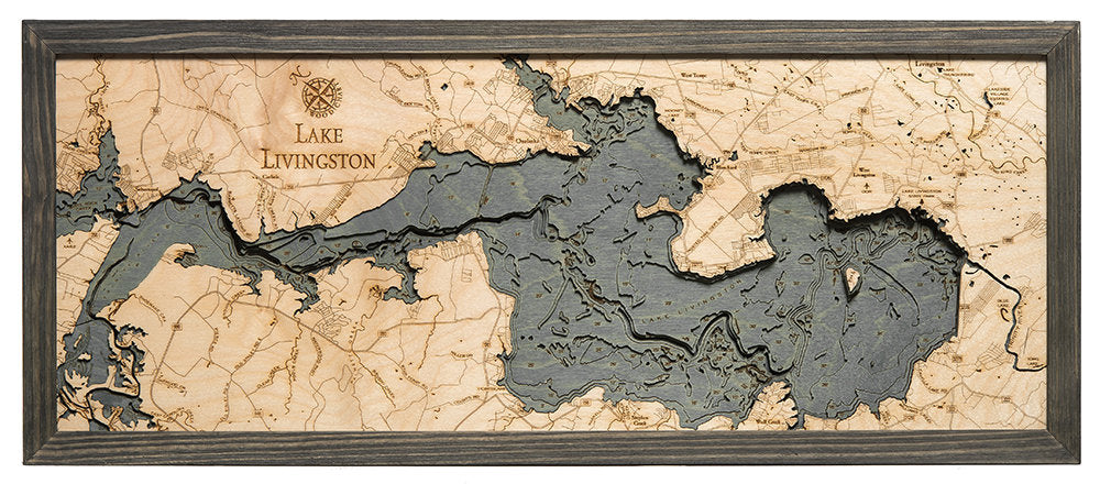 Lake Livingston, Texas 3D layered wood map in laser-cut Baltic birch, shown framed against a light wall
