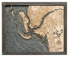 Fort Myers, Florida 3D layered wood map in laser-cut Baltic birch, shown framed against a light wall