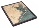 Houston, Texas 3D layered wood map in laser-cut Baltic birch, shown framed against a light wall