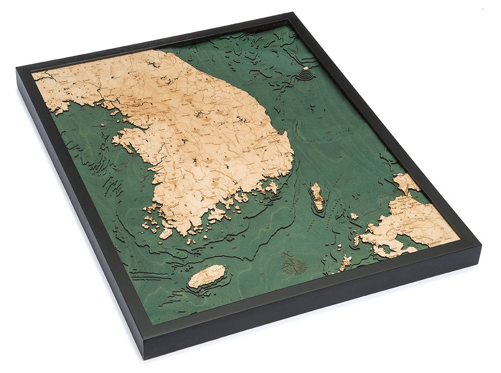 South Korea 3D layered wood map in laser-cut Baltic birch, shown framed against a light wall