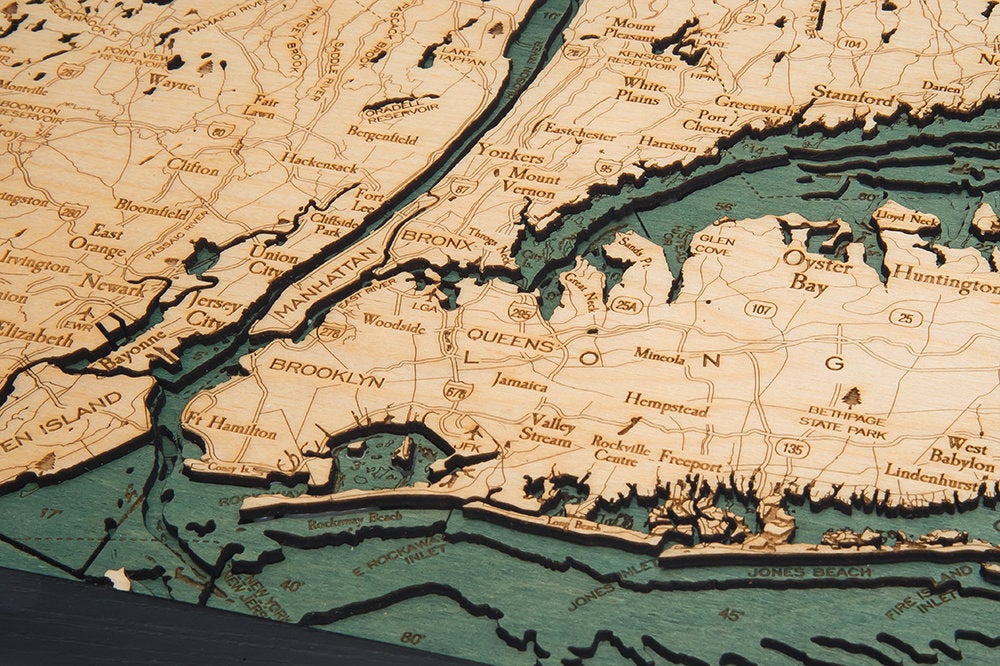 Long Island Sound 3D layered wood map in laser-cut Baltic birch, shown framed against a light wall