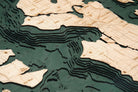 Seattle, Washington 3D layered wood map in laser-cut Baltic birch, shown framed against a light wall