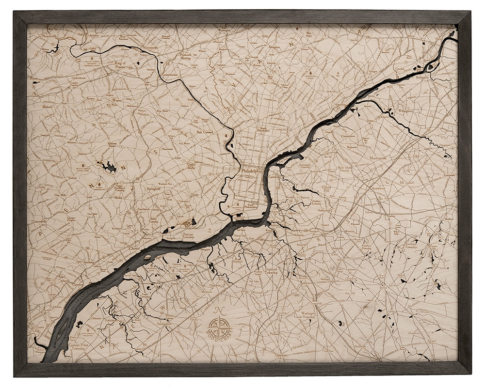 Philadelphia, Pennsylvania 3D layered wood map in laser-cut Baltic birch, shown framed against a light wall