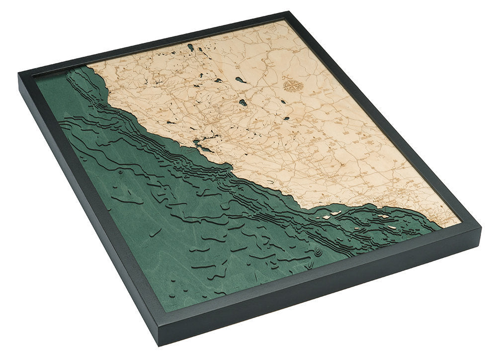 California Coast 3D layered wood map in laser-cut Baltic birch, shown framed against a light wall