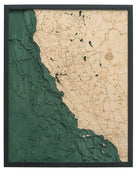 California Coast 3D layered wood map in laser-cut Baltic birch, shown framed against a light wall