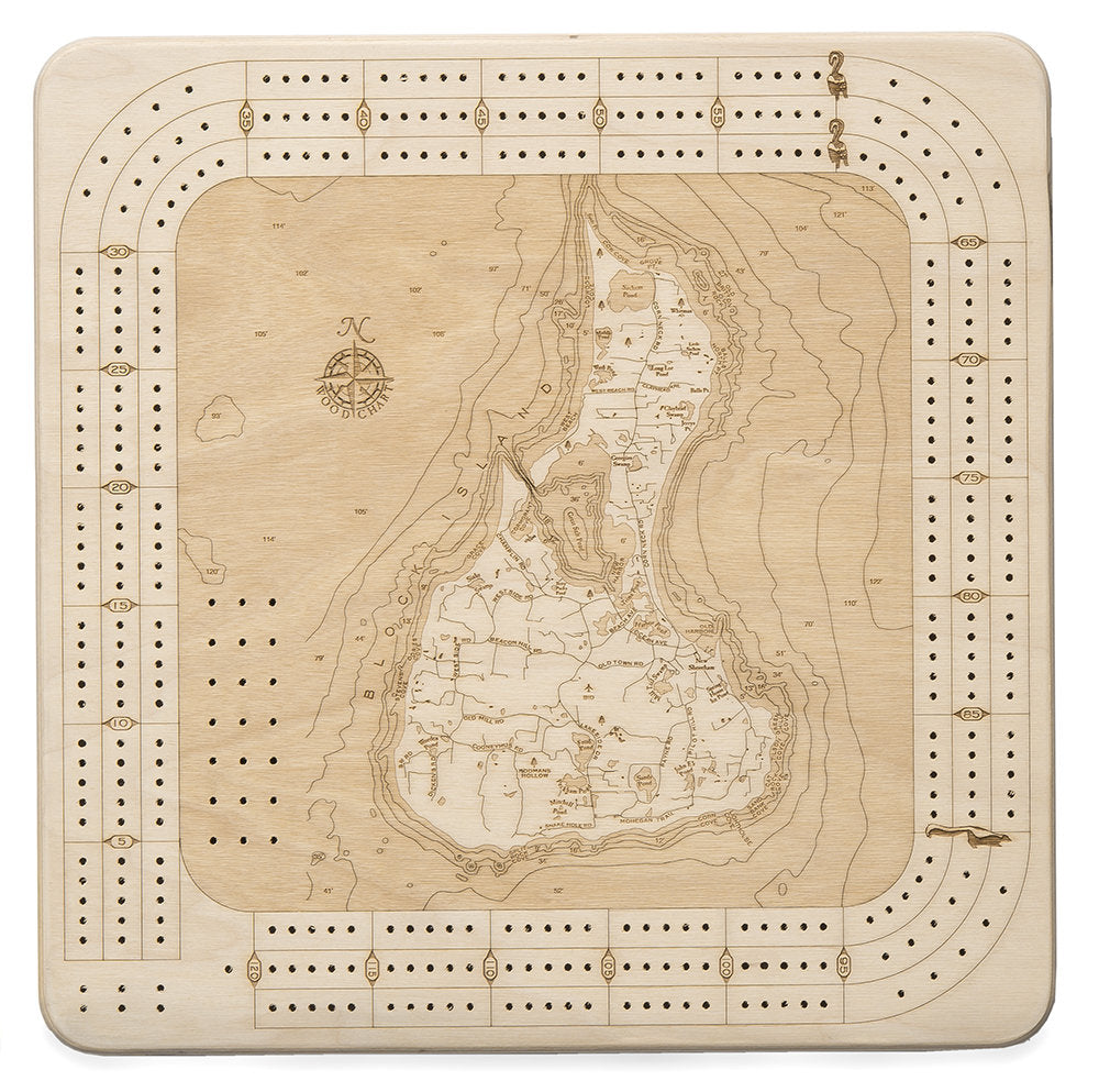 Block Island, Rhode Island wood cribbage board in laser-cut Baltic birch, shown framed against a light wall