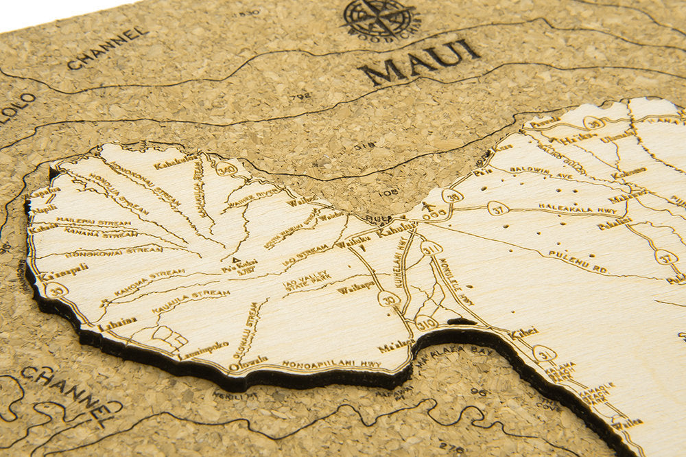 Maui, Hawaii framed cork map in laser-cut Baltic birch, shown framed against a light wall