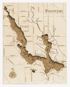 Walloon Lake, Michigan framed cork map in laser-cut Baltic birch, shown framed against a light wall