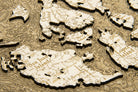 San Juan Islands, Washington framed cork map in laser-cut Baltic birch, shown framed against a light wall