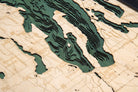 M-22, Michigan 3D layered wood map in laser-cut Baltic birch, shown framed against a light wall