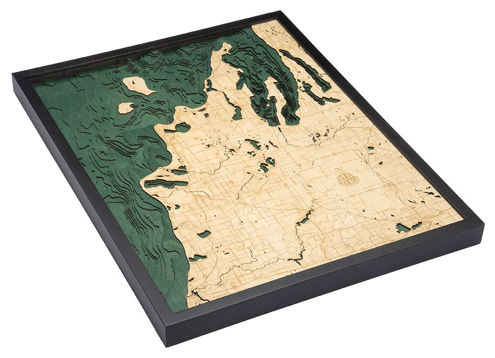 M-22, Michigan 3D layered wood map in laser-cut Baltic birch, shown framed against a light wall
