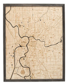 Sacramento, California 3D layered wood map in laser-cut Baltic birch, shown framed against a light wall