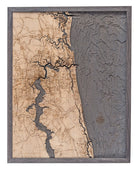 Jacksonville, Florida 3D layered wood map in laser-cut Baltic birch, shown framed against a light wall