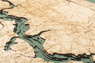 Jacksonville, Florida 3D layered wood map in laser-cut Baltic birch, shown framed against a light wall