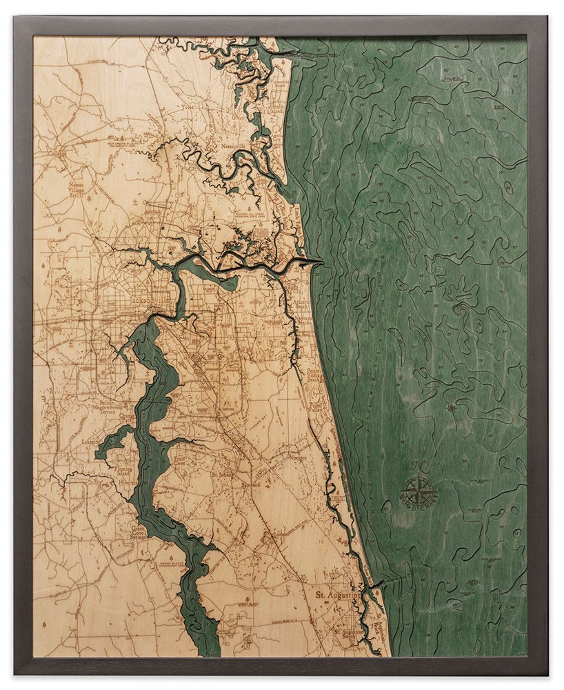 Jacksonville, Florida 3D layered wood map in laser-cut Baltic birch, shown framed against a light wall