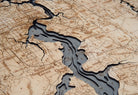 Jacksonville, Florida 3D layered wood map in laser-cut Baltic birch, shown framed against a light wall
