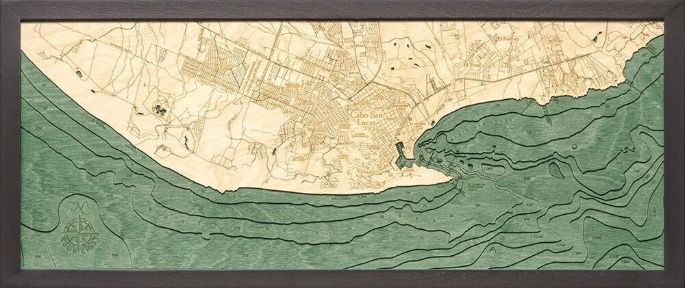 Cabo San Lucas, Mexico 3D layered wood map in laser-cut Baltic birch, shown framed against a light wall