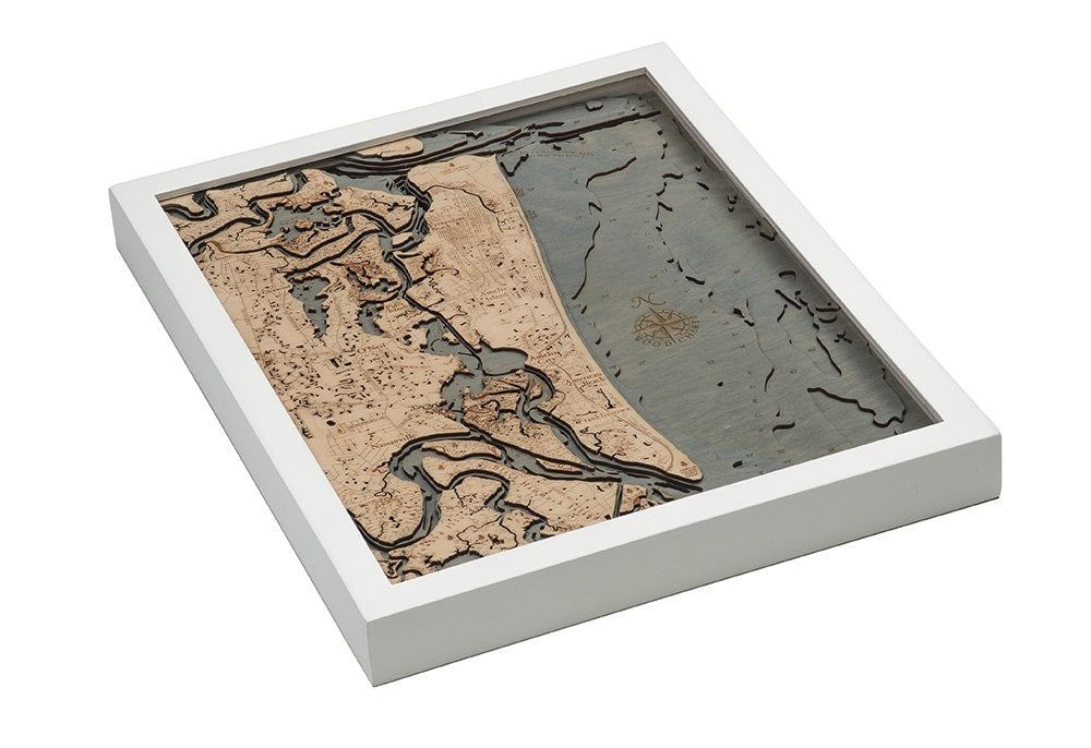 Amelia Island, Florida 3D layered wood map in laser-cut Baltic birch, shown framed against a light wall