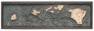 Hawaiian Islands 3D layered wood map in laser-cut Baltic birch, shown framed against a light wall