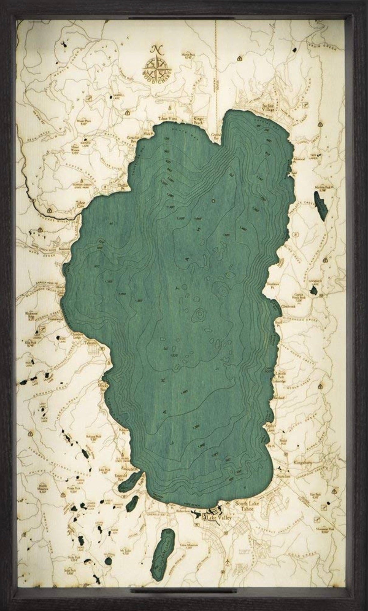 Lake Tahoe, California wood serving tray in laser-cut Baltic birch, shown framed against a light wall