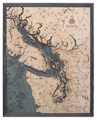Salish Sea, Washington 3D layered wood map in laser-cut Baltic birch, shown framed against a light wall