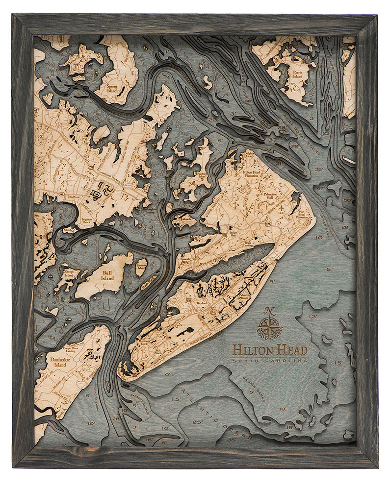 Hilton Head, South Carolina 3D layered wood map in laser-cut Baltic birch, shown framed against a light wall