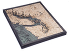Salish Sea, Washington 3D layered wood map in laser-cut Baltic birch, shown framed against a light wall