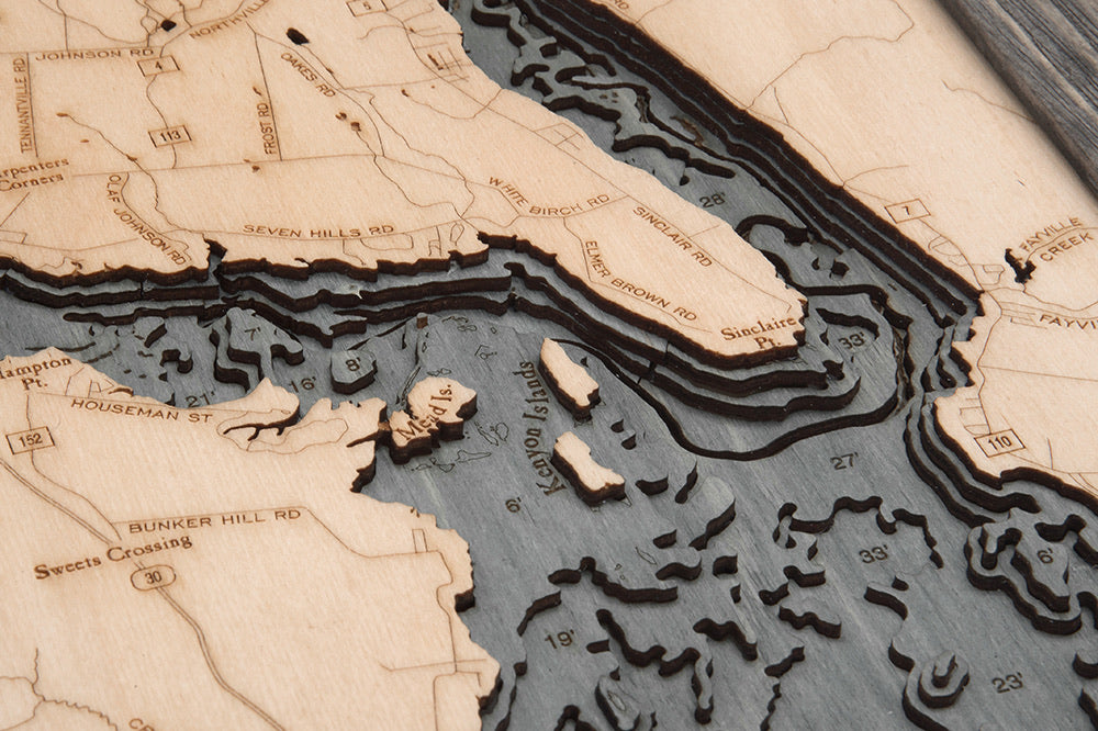 Great Sacandaga Lake, New York 3D layered wood map in laser-cut Baltic birch, shown framed against a light wall