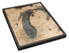 Lake Michigan 3D layered wood map in laser-cut Baltic birch, shown framed against a light wall