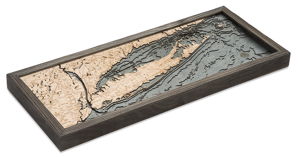 Long Island Sound 3D layered wood map in laser-cut Baltic birch, shown framed against a light wall