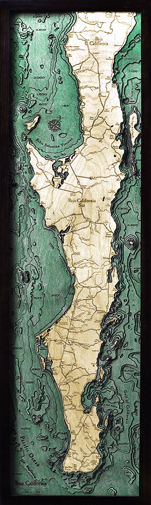 Baja California, Mexico 3D layered wood map in laser-cut Baltic birch, shown framed against a light wall