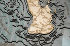 Baja California, Mexico 3D layered wood map in laser-cut Baltic birch, shown framed against a light wall