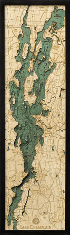 Lake Champlain 3D layered wood map in laser-cut Baltic birch, shown framed against a light wall