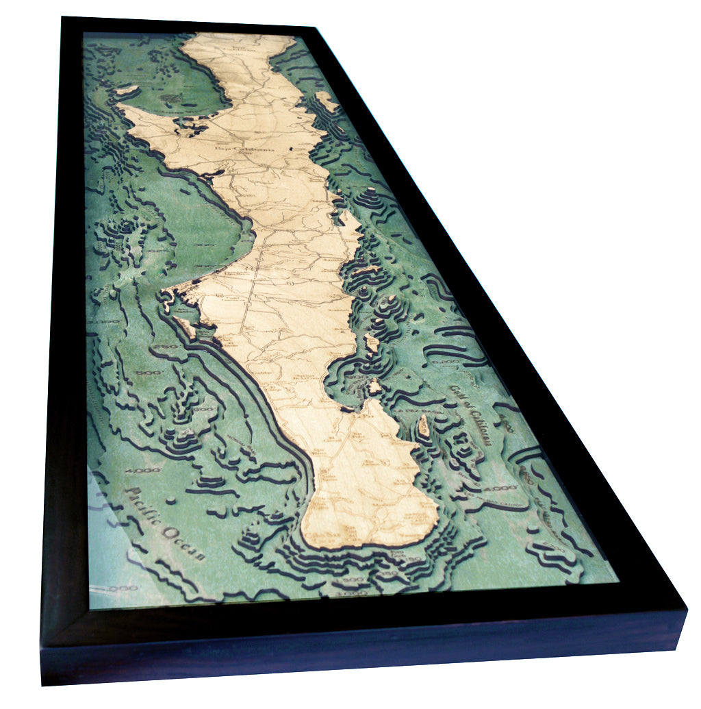 Baja California, Mexico 3D layered wood map in laser-cut Baltic birch, shown framed against a light wall